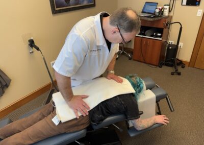 Patient being treated at Warwick Chiropractic after finding out how long is a chiropractic appointment